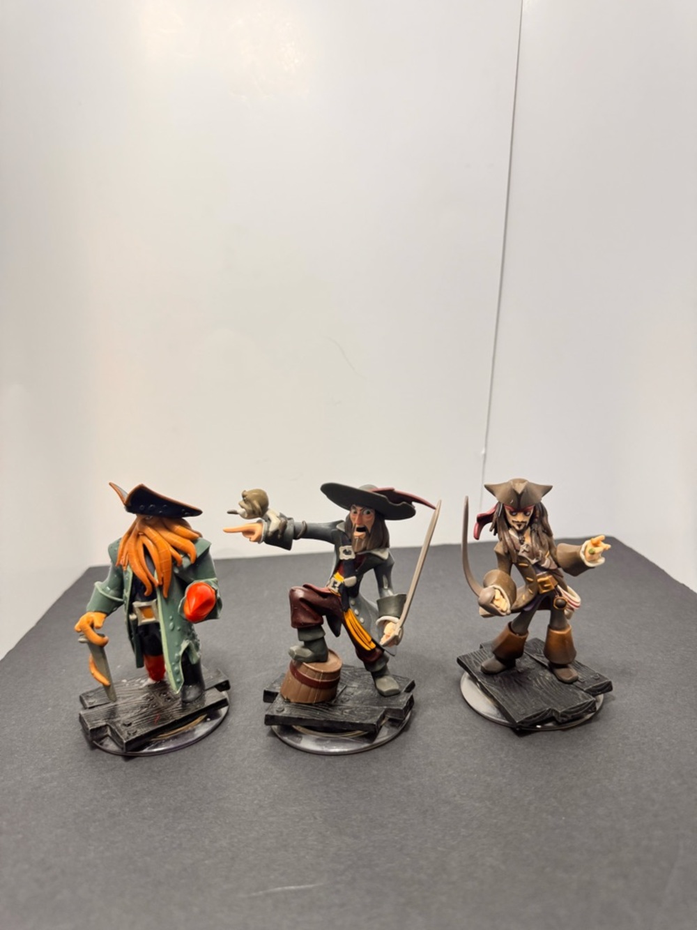 Disney Pirate Figure Trio - Green, Black, Brown, Orange